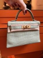 Kelly mini alligator handbag